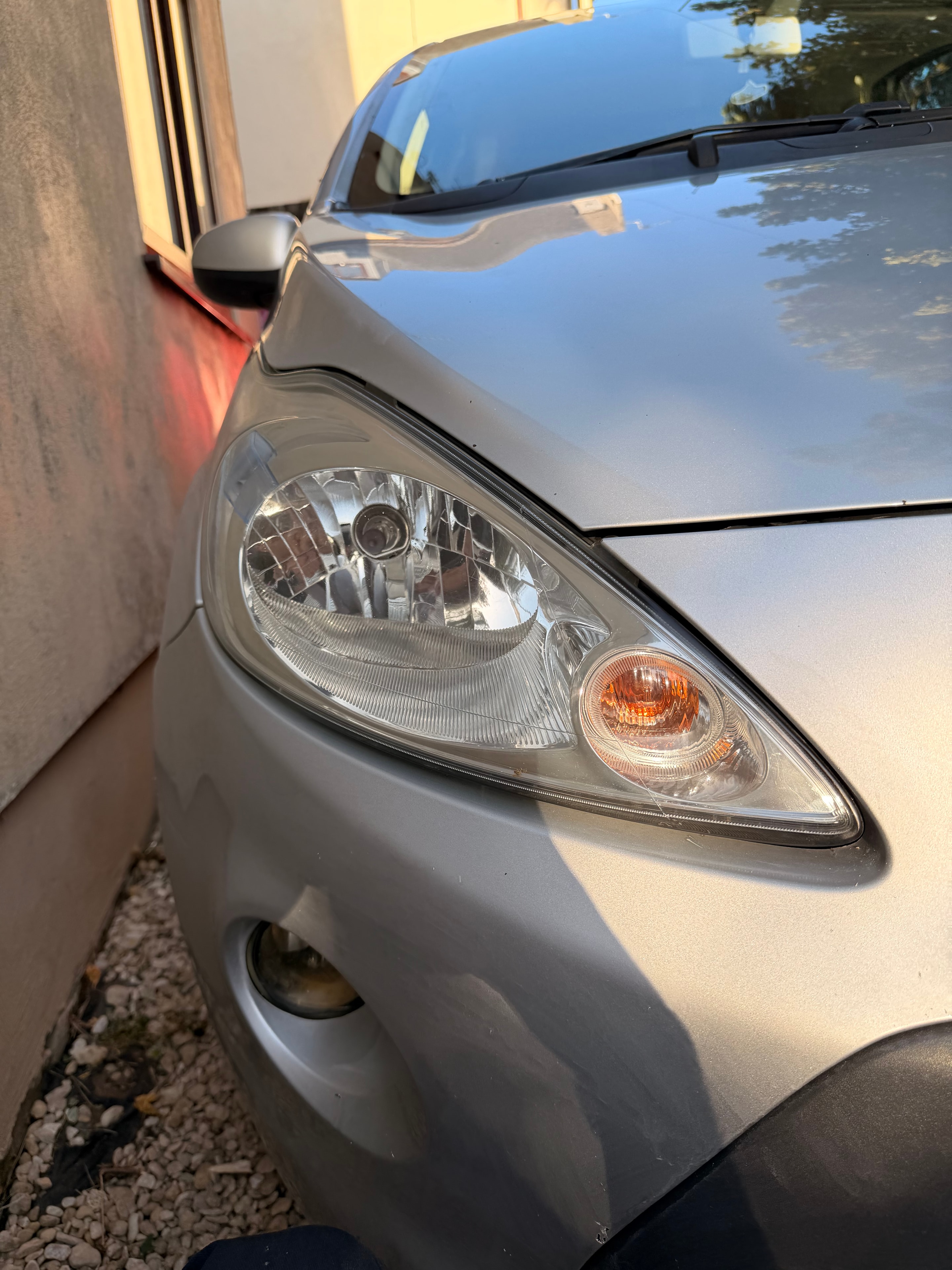 Headlight after restoration — crystal clear polished lens